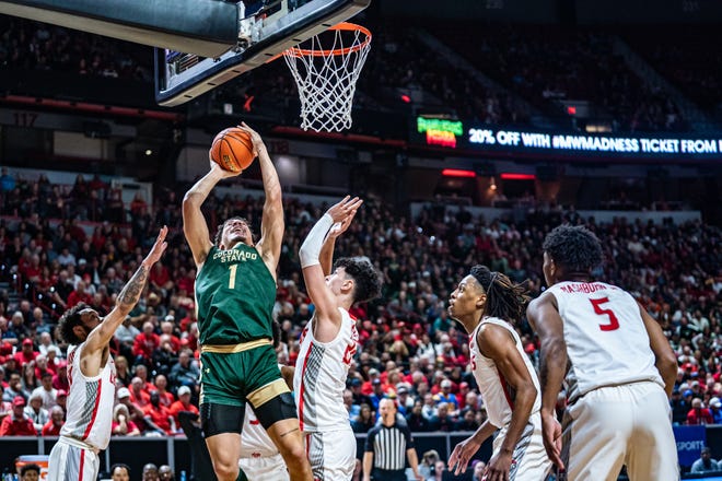 Colorado State men's basketball player Joel Scott shoots during a Mountain West semifinal game against New Mexico on Friday, March 15, 2024.