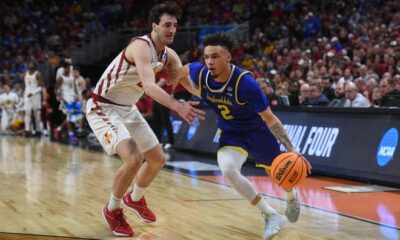 South Dakota State's guard Zeke Mayo (2) drives to the basket during the second half on Thursday, March 21, 2024 at the CHI Health Center in Omaha, Nebraska.