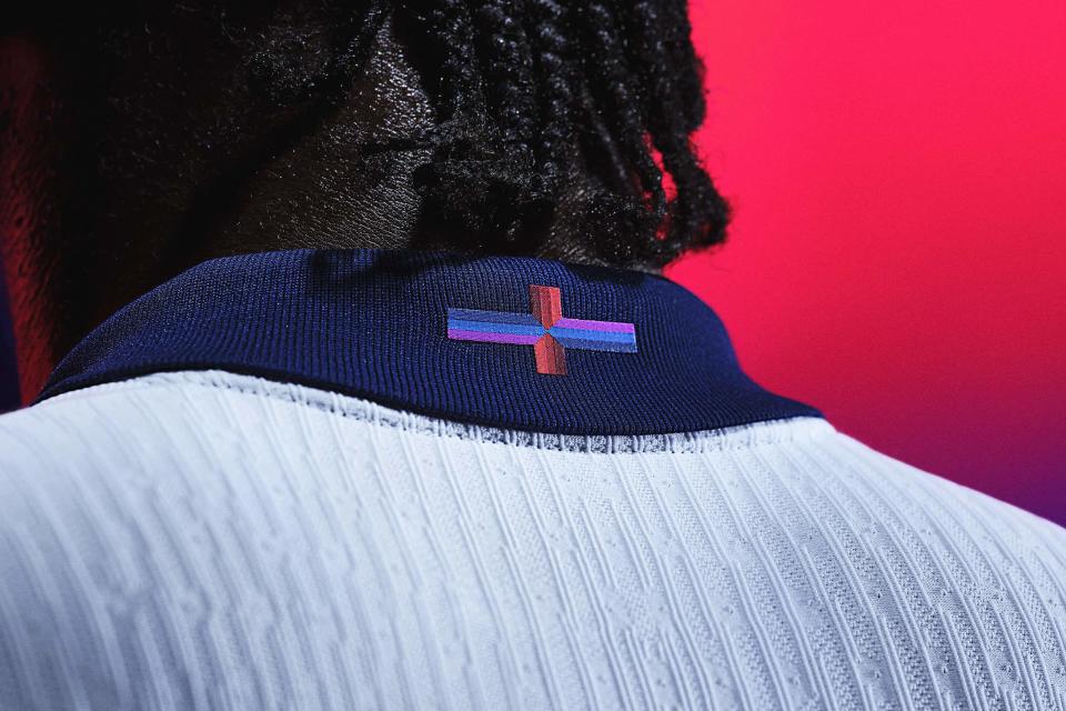 Nike has altered the appearance of the St George’s Cross using purple and blue horizontal stripes (Nike Handout/PA) (PA Media)