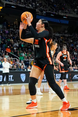 Oregon State Beavers forward Timea Gardiner (30) shoots a layup against the Notre Dame Fighting Irish during the second half in the semifinals of the Albany Regional of the 2024 NCAA Tournament at the MVP Arena March 29, 2024, in Albany, New York.