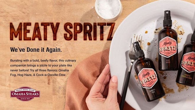 Omaha Steaks Meaty Spritz sprays, announced for April Fools' Day, would come in flavors such as Omaha Fog, Hog Haze, and Cock-a-Doodle-Dew.