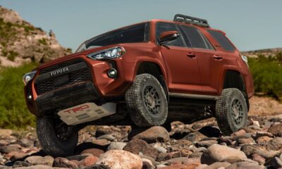 2024 Toyota 4Runner climbing over rocks.