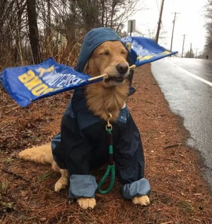 Spencer, wearing his rain coat, in a photo that went viral during the 2018 Boston Marathon.