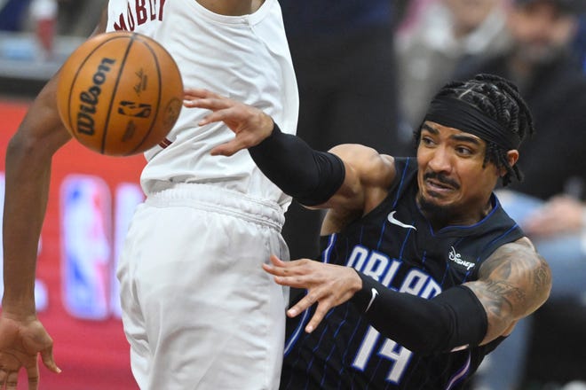 Orlando Magic guard Gary Harris throws a pass in the first quarter against the Cleveland Cavaliers during Game 2 of the first-round playoff series, April 22, 2024, in Cleveland.