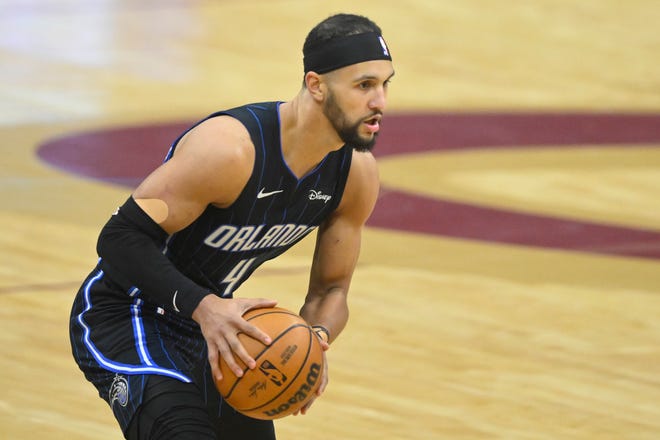 Orlando Magic guard Jalen Suggs looks to pass in the first quarter against the Cavaliers during Game 2 of the first-round playoff series, April 22, 2024, in Cleveland.