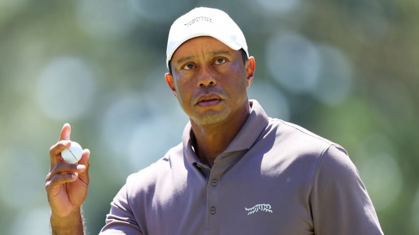 AUGUSTA, GEORGIA - APRIL 12: Tiger Woods of the United States reacts on the eighth green during the second round of the 2024 Masters Tournament at Augusta National Golf Club on April 12, 2024 in Augusta, Georgia. (Photo by Andrew Redington/Getty Images)