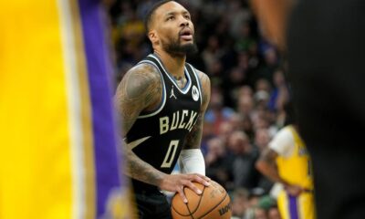 Milwaukee Bucks guard Damian Lillard (0) makes a free throw during the first overtime of their game Tuesday March 26, 2024 at Fiserv Forum in Milwaukee, Wisconsin. The Los Angeles Lakers beat the Milwaukee Bucks 128-124 in double overtime.