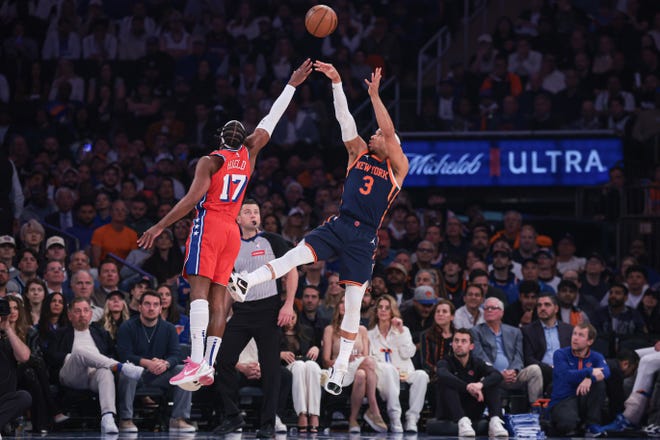 Apr 22, 2024; New York, New York, USA; New York Knicks guard Josh Hart (3) shoots the ball as Philadelphia 76ers guard Buddy Hield (17) defends during the first half during game two of the first round for the 2024 NBA playoffs at Madison Square Garden. Mandatory Credit: Vincent Carchietta-USA TODAY Sports