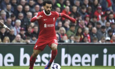 Salah fires title-chasing Liverpool to 2-1 win against Brighton, top of the standings