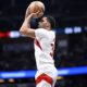 Toronto Raptors center Jontay Porter attempts a 3-point shot during the second half of an NBA basketball game against the Orlando Magic, Sunday, March 17, 2024, in Orlando, Fla. (AP Photo/Phelan M. Ebenhack)