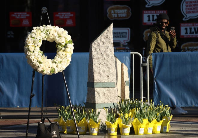 A general view as a wreath and flowers are seen at a memorial site on Boylston Street on the eleventh anniversary of the Boston Marathon bombing of 2013 during The 128th Boston Marathon on April 15, 2024.