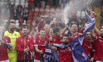 Wrexham gains promotion to English soccer's third division after 6-0 win