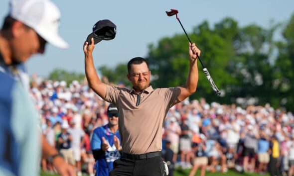 Xander Schauffele celebrates after winning the PGA Championship golf tournament at Valhalla Golf Club.