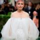 Michelle Williams Debuts Bold Pink Pixie Cut at the 2024 Met Gala