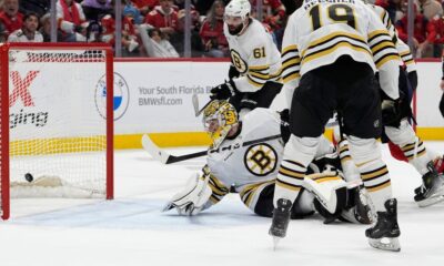 The puck gets past Boston Bruins goaltender Jeremy Swayman on a goal by Florida Panthers center Aleksander Barkov during the second period of Game 2 of a second-round series of the NHL hockey Stanley Cup playoffs Wednesday, May 8, 2024, in Sunrise, Fla. (AP Photo/Lynne Sladky)