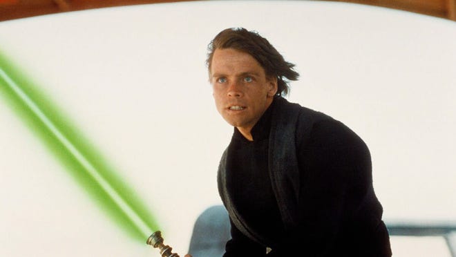 Luke Skywalker (Mark Hamill) prepares to give someone the business end of his lightsaber in
