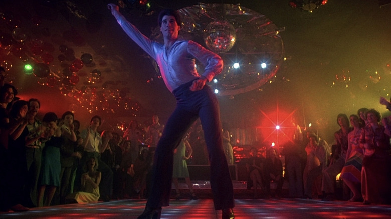 John Travolta as Tony Manero dancing in Saturday Night Fever
