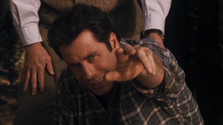 John Travolta as George Malley using his new powers in Phenomenon