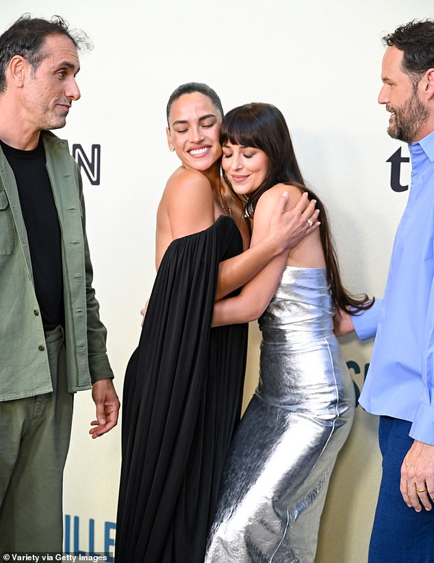 Dakota shared a sweet hug with her co-star