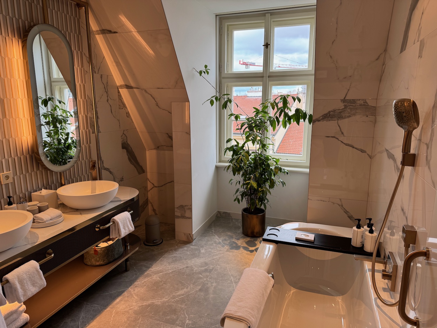 a bathroom with a tub and sink