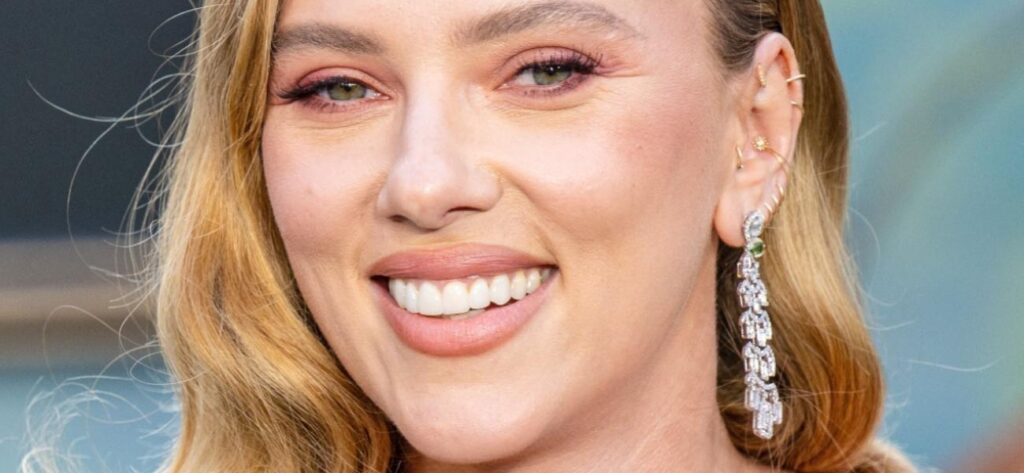 Scarlett Johansson In Plunging Bikini Bullied Over 'Extra Pounds'