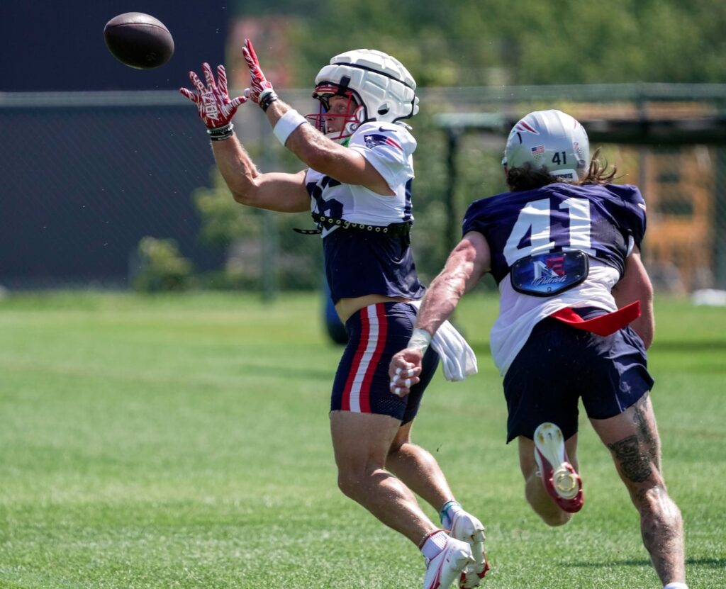 Patriots wide receiver Efton Chism (left) is trying to make the team after being undrafted out of Eastern Washington.