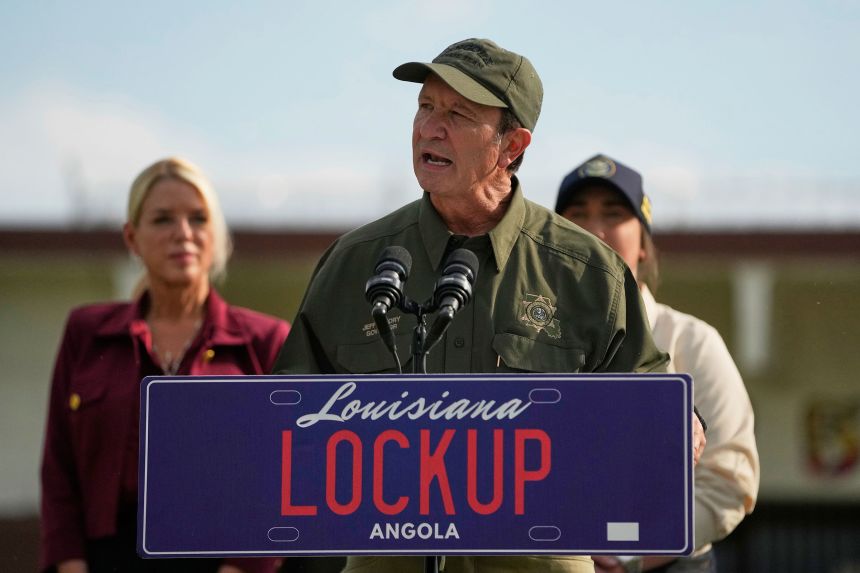 Louisiana Gov. Jeff Landry speaks to reporters outside