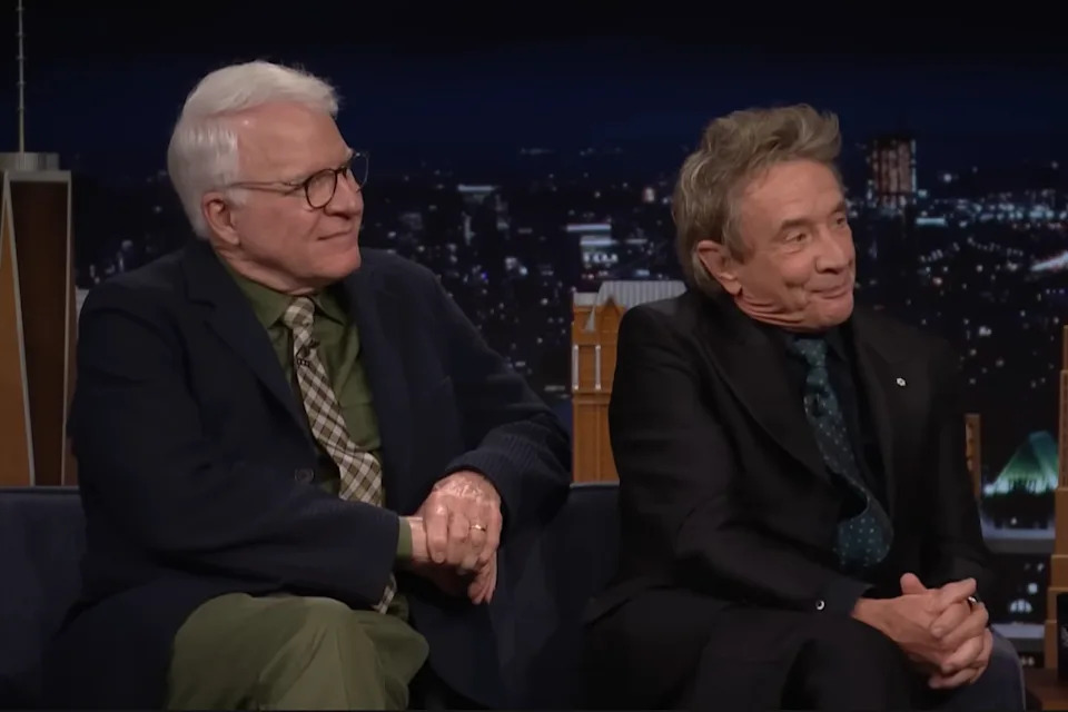 Steve and Martin sitting on a talk show set