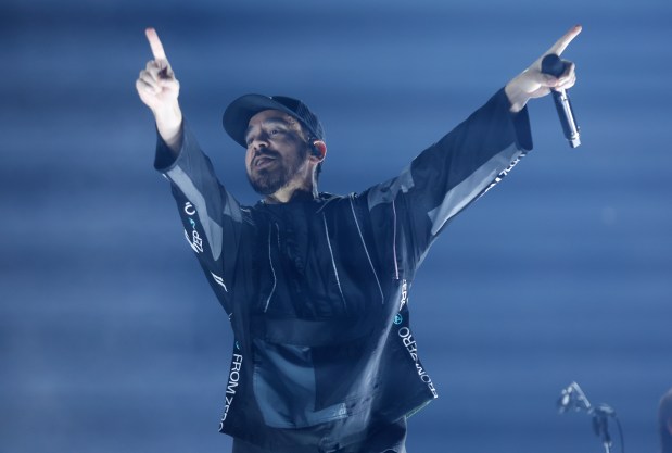 Linkin Park's Mike Shinoda performs during their 