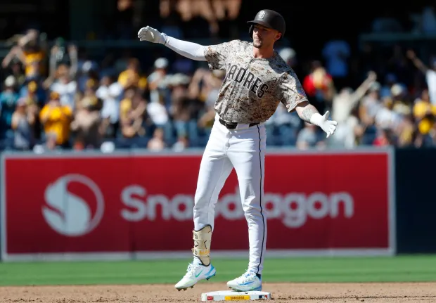Jackson Merrill #3 of the San Diego Padres celebrates a two-run double in the fifth inning against the Arizona Diamondbacks at Petco Park on Sept. 28, 2025 in San Diego, California. (K.C. Alfred / The San Diego Union-Tribune)
