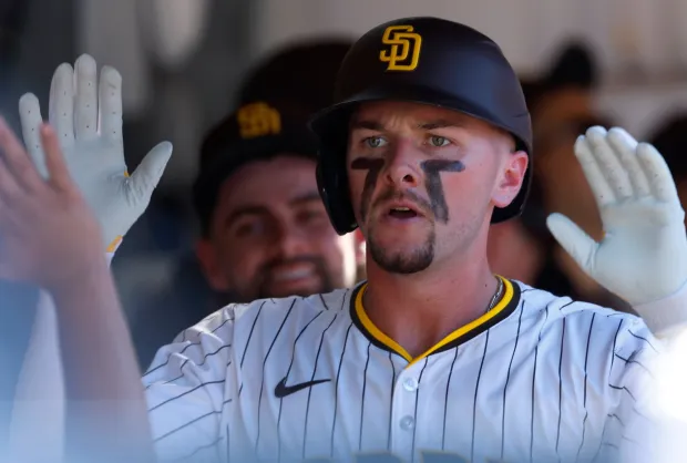 Jackson Merrill #3 of the San Diego Padres celebrates in the dugout after hitting a solo home run in the sixth inning against the Milwaukee Brewers at Petco Park on Sept. 24, 2025 in San Diego, CA. (Photo by K.C. Alfred / The San Diego Union-Tribune)