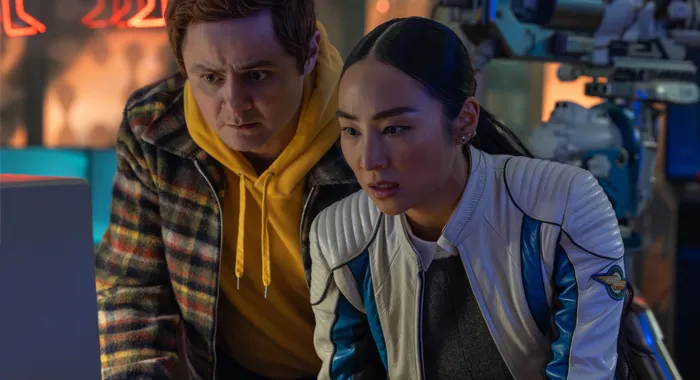 Arturo Castro and Greta Lee in TRON: Ares (2025)